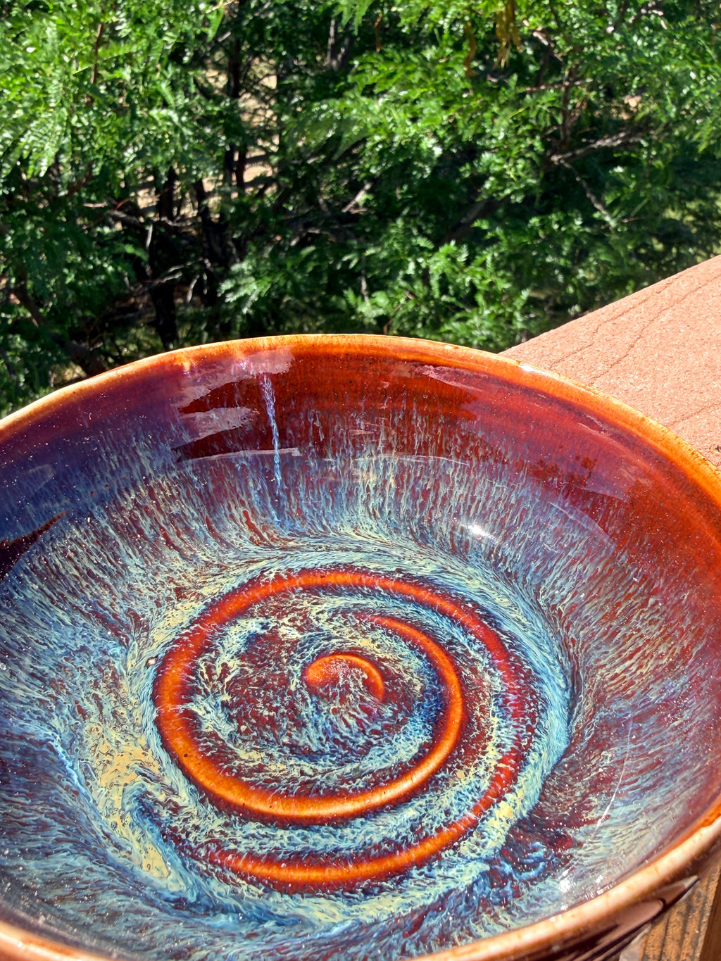 Garnet and blue glazed bowl